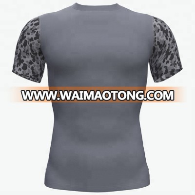 China custom gym logo black rashguard uv rash guard shirts